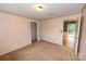Spacious bedroom featuring plush carpet, a ceiling light, and an ample closet space at 2625 Glenn St, Newton, NC 28658