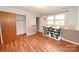 Bedroom featuring wood flooring, a closet, and a window with plenty of natural light at 2625 Glenn St, Newton, NC 28658