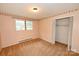 Cozy bedroom featuring a large window providing natural light and a spacious closet at 2625 Glenn St, Newton, NC 28658