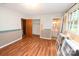 Bedroom with wood floors, a closet, and a view into the bathroom at 2625 Glenn St, Newton, NC 28658