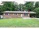 Well-maintained single story brick house with nice yard and a convenient covered carport at 2625 Glenn St, Newton, NC 28658