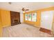 Inviting living room with a brick fireplace, built-in shelving, and lots of natural light at 2625 Glenn St, Newton, NC 28658