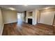 Inviting living room featuring a fireplace, hardwood floors and a bright, open layout at 3208 Barons Court Rd, Charlotte, NC 28213