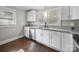 Modern kitchen features granite counters, stainless steel appliances and ample natural light at 322 Peachtree St, Albemarle, NC 28001