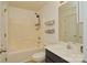 Bathroom features a tub/shower combination and single sink vanity with an updated mirror at 4001 Brook Valley Run, Monroe, NC 28110