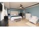 Spacious bedroom with tray ceiling, ceiling fan, and stylish furnishings at 4001 Brook Valley Run, Monroe, NC 28110