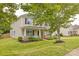 Beautiful two-story home featuring a cozy front porch, nicely landscaped lawn, and classic design at 4001 Brook Valley Run, Monroe, NC 28110