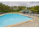 Relax at the community pool with ample seating and a beautiful clubhouse nearby at 4001 Brook Valley Run, Monroe, NC 28110