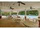 Inviting outdoor pool area with covered seating and tables with chairs at 4001 Brook Valley Run, Monroe, NC 28110