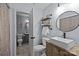 Updated bathroom featuring modern vanity, shower with curtain, and stylish fixtures, offering a spa-like experience at 4043 Windward Dr, Fort Mill, SC 29708