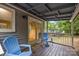 Charming covered porch with seating, perfect for enjoying the outdoors at 4043 Windward Dr, Fort Mill, SC 29708