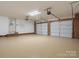Spacious garage with two car capacity, epoxy floors and two automatic overhead doors at 4126 Howie Cir, Charlotte, NC 28205