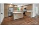 Modern kitchen with stainless steel appliances, wooden cabinets, and a functional island at 4126 Howie Cir, Charlotte, NC 28205