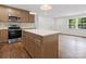 Kitchen area featuring stainless steel appliances and a kitchen island at 4126 Howie Cir, Charlotte, NC 28205