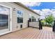 View of home's back deck and house with natural lighting and view of backyard area and fence at 4197 Canopy Creek Dr, Denver, NC 28037