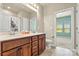 Bathroom featuring double vanity, tiled flooring, a shower, and a toilet at 4197 Canopy Creek Dr, Denver, NC 28037