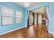 Charming dining area with large windows, natural light, and view into the kitchen, perfect for gatherings at 4197 Canopy Creek Dr, Denver, NC 28037