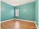 Formal dining room boasts modern lighting and ample space for Gathering dinners, ideal for hosting memorable gatherings at 4197 Canopy Creek Dr, Denver, NC 28037