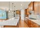 Well-equipped kitchen with an island, stainless steel appliances, and seamless access to the living spaces at 4197 Canopy Creek Dr, Denver, NC 28037