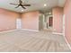 Spacious living room featuring plush carpet, recessed lights, and multiple entrances at 4197 Canopy Creek Dr, Denver, NC 28037