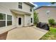 Rear patio with grass and iron fence at 424 Castlebury Ct, Clover, SC 29710