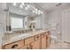 Elegant bathroom with dual sinks, granite countertops, and modern fixtures, offering a spa-like experience at 424 Castlebury Ct, Clover, SC 29710