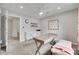 Stylish bedroom with plenty of natural light, plus a large work desk and seating area at 424 Castlebury Ct, Clover, SC 29710