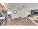 Spacious living area featuring hardwood floors, kitchen and dining area at 424 Castlebury Ct, Clover, SC 29710