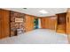 The finished basement has wood paneled walls and access to the yard at 460 27Th Avenue Nw Cir, Hickory, NC 28601