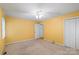 This bedroom has a ceiling fan, a large closet, and natural light at 460 27Th Avenue Nw Cir, Hickory, NC 28601
