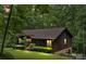 Charming single-story home with a wood exterior and lush green lawn at 460 27Th Avenue Nw Cir, Hickory, NC 28601