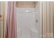 Bathroom shower features a standard shower head, and built in seat for convenience at 460 27Th Avenue Nw Cir, Hickory, NC 28601