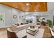 An open layout showcases the living room leading into the dining room and kitchen at 4838 Keats Ave, Charlotte, NC 28212