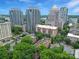 Aerial view of buildings surrounded by lush greenery in urban environment at 515 N Church St # 305, Charlotte, NC 28202