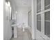 Contemporary bathroom with pedestal sink and sleek, glass-enclosed shower at 515 N Church St # 305, Charlotte, NC 28202