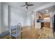 Bright, open living space with modern finishes, hardwood floors and a dining area at 515 N Church St # 305, Charlotte, NC 28202