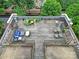 Large rooftop deck featuring an assortment of plants and outdoor furniture, perfect for city living at 515 N Church St # 305, Charlotte, NC 28202