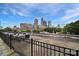 Rooftop view featuring city skyline from behind a black railing at 515 N Church St # 305, Charlotte, NC 28202