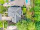 Aerial view of the house with a lush backyard, patio, and swimming pool at 5518 Morris Hunt Dr, Fort Mill, SC 29708
