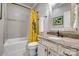 Charming bathroom with tub and shower combo, vanity, and designer mirror at 5518 Morris Hunt Dr, Fort Mill, SC 29708
