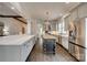 Gourmet kitchen featuring an island with seating, stainless steel appliances, and lots of countertop space at 5518 Morris Hunt Dr, Fort Mill, SC 29708