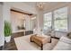 Spacious living room featuring elegant decor, hardwood floors, and a view of the home office at 5518 Morris Hunt Dr, Fort Mill, SC 29708
