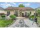 Backyard with patio, outdoor seating, grill, garden boxes, and mature landscaping at 5829 Andrew Ward Ave, Charlotte, NC 28216