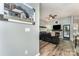 Cozy living room showcases wood floors, a fireplace with a TV, and a comfortable leather couch at 5829 Andrew Ward Ave, Charlotte, NC 28216