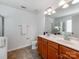 Bathroom featuring a double vanity, modern fixtures, and a separate shower at 6532 Prosperity Commons Dr, Charlotte, NC 28269