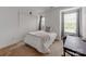 Comfortable bedroom with a queen-size bed, natural light, and ample closet space at 6532 Prosperity Commons Dr, Charlotte, NC 28269
