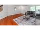 Spacious living area featuring hardwood floors, neutral decor, and ample natural light at 6532 Prosperity Commons Dr, Charlotte, NC 28269