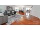 Bright and airy living room with hardwood floors, modern decor, and an open layout at 6532 Prosperity Commons Dr, Charlotte, NC 28269