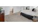 Spacious main bedroom with ample natural light, a large bed, and a peek into the bathroom at 6532 Prosperity Commons Dr, Charlotte, NC 28269