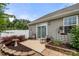 The peaceful backyard features a patio, small garden, and lush foliage for a relaxing, private outdoor space at 7130 Maricopa Rd, Charlotte, NC 28277